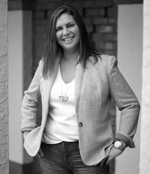 manager lee ann dolcetto smiling wearing blazer jacket